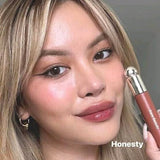 Rare beauty lip oil honesty shade